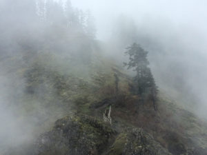 stairs on mountain slope in the clouds